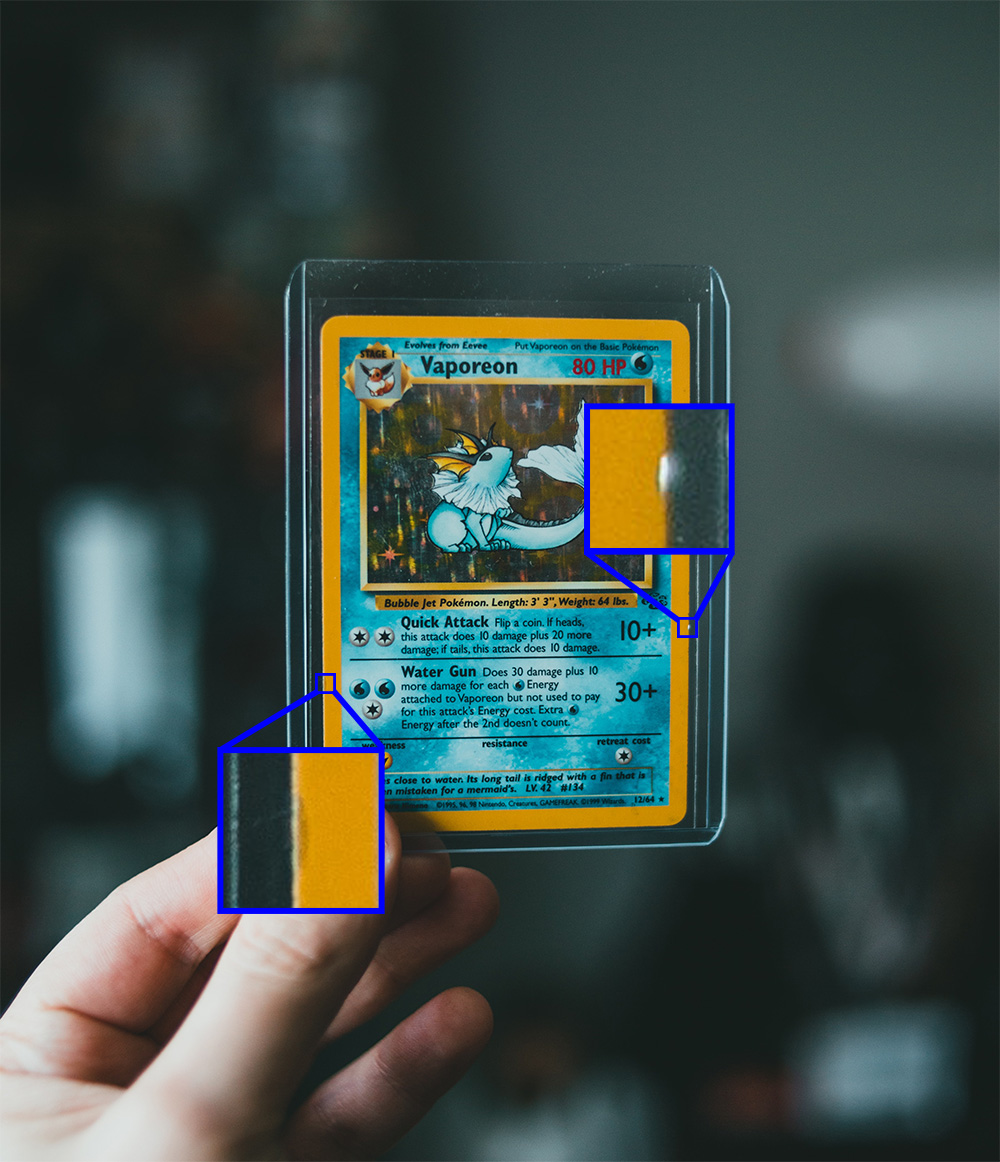 A Vaporeon card with some condition flaws.