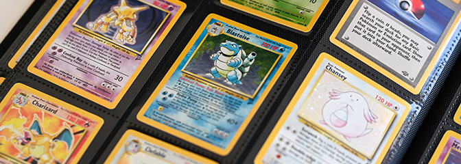 A collection of pokemon cards sprawled out, overlapping each other
